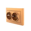 Розетка 2-м СП Mira 16А IP20 с заземл. со вставкой керамика зол. метал. LEZARD 701-1313-127